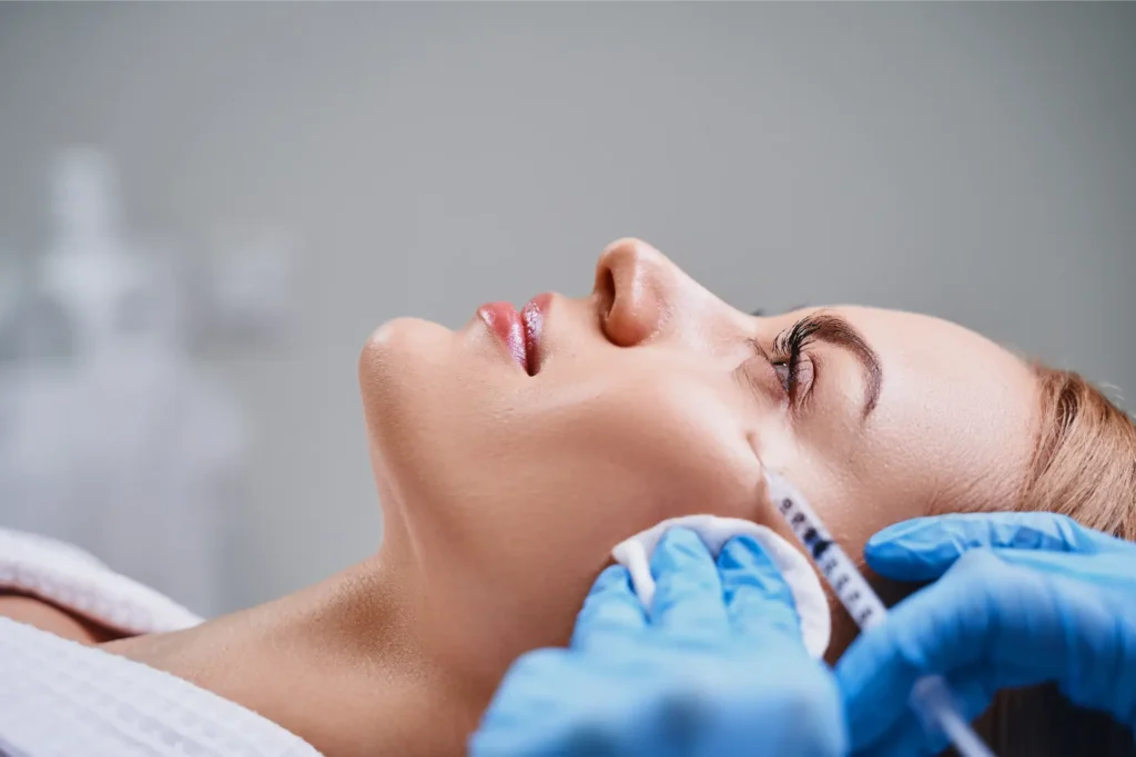Close-up of woman undergoing PDO thread lift cosmetic procedure